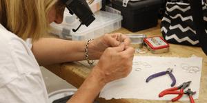 Woman working on making jewelry